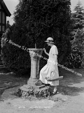 HUGH & MRS TAYLOR IN GARDEN